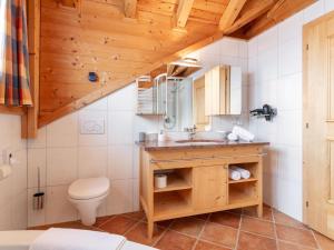 a bathroom with a sink and a toilet at Bergsehnsucht in Hippach +45 photos