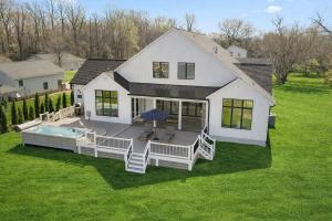 an aerial view of a house with a swimming pool at Bay Dreaming in Montross