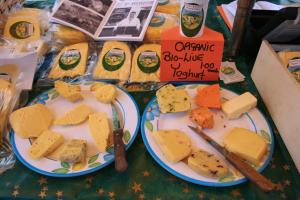 two plates of cheese and bread on a table at Feirm Cottage in Kenmare