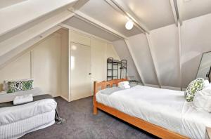 a bedroom with two beds in a room at The Meadow Suite in Pokolbin