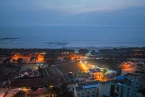 an overhead view of a city at night at Silver Glowing Sea Pension in Taean +48 photos