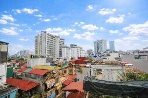 a view of a city with tall buildings at Green West Lake Residence in Hanoi +50 photos