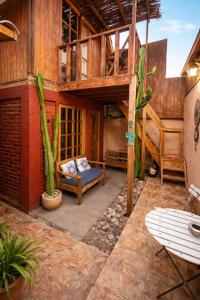 a patio of a house with a cactus at Hostal Cactus Copiapo in Copiapó