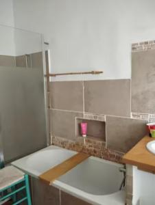 a kitchen with a sink and a counter top at atypical house garden in Saint-Paulet-de-Caisson +11 photos