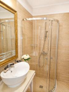 a bathroom with a sink and a shower at Harmony 20 Sveti Vlas Private Apartment 211 in Sveti Vlas