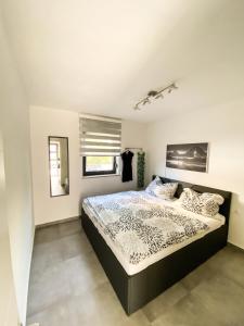 a bedroom with a large bed in a room at Villa Martina in Novigrad Istria
