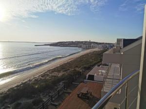 a view of the beach from the balcony of a condo at Langebaan Beach Towers in Langebaan +5 photos