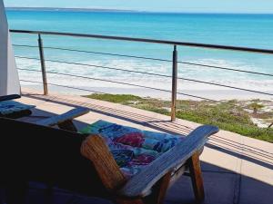 a balcony with a view of the beach and the ocean at Langebaan Beach Towers in Langebaan