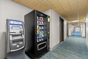 an atm machine in the hallway of a hospital at Country Inn & Suites by Radisson Kenosha - Pleasant Prairie in Kenosha