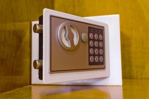 a white switch with a remote control on a table at Mbao Boutique Bungalows in Jambiani