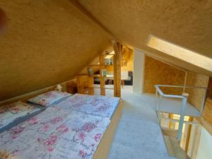 a bedroom with a bed and a bunk bed at Doudleby u Českých Budějovic in Doudleby
