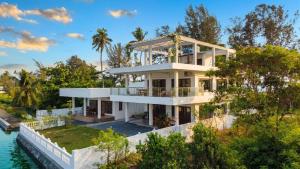 an aerial view of a house on the water at Willostays Tamarind beach villa in Cherai Beach