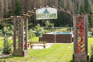 a pavilion with a sign that reads river park at Hotel Grohmann in Campitello di Fassa