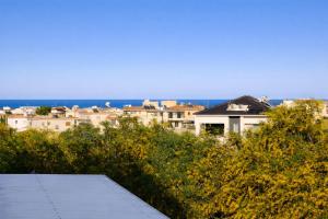 a view of a city from the roof of a building at Pantelia Apartment Paralimni in Paralimni