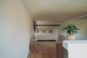 Llit o llits en una habitació de Hoeve1675