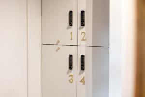 a white cabinet with numbers on it at The Kylestrome in Ayr
