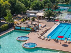 an aerial view of a pool at a resort at Club del Sole La Risacca Family Collection in Porto SantʼElpidio