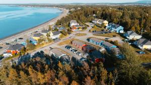 an aerial view of a resort next to the beach at Navigateur Ste-Luce in Sainte-Luce-sur-Mer