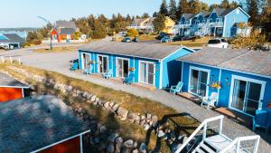 an aerial view of a small blue house at Navigateur Ste-Luce in Sainte-Luce-sur-Mer