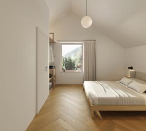 a white bedroom with a bed and a window at NOOK - Nature Hideaway in Bad Aussee