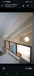 a picture of a room with a bed in a room at Dolphin View 32 in Langstrand