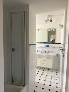 a bathroom with a shower and a sink at Nusshof in Berchtesgaden +60 photos