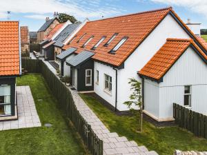 a row of houses with orange roofs at Mayflower - Uk43632 in Grange