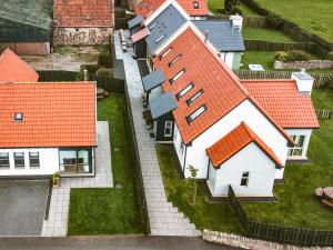 an overhead view of a group of houses with orange roofs at Mayflower - Uk43632 in Grange