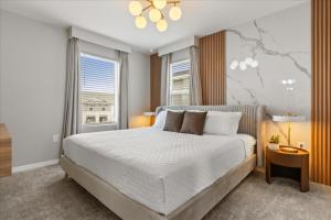 a bedroom with a large bed and a window at Ev16147 - Coastal Manor in Clermont +32 photos