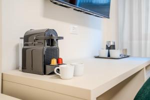 a coffee maker sitting on a counter in a room at Italianflat - Duomo Atmosphere Two in Milan