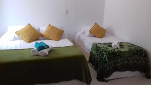 Giường trong phòng chung tại Pousada Boa Vida