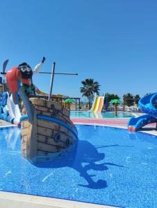 a water park with a pirate ship in the water at Eser Diamond Hotel Spa & Convention Center İstanbul in Silivri