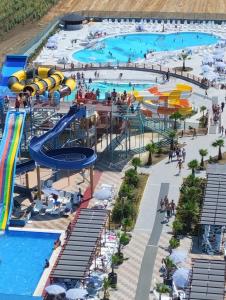 an aerial view of a pool at a water park at Eser Diamond Hotel Spa & Convention Center İstanbul in Silivri
