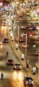 a busy city street with cars on a busy street at Private apartment beach resort in Hurghada