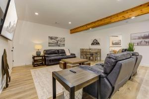 a living room with a couch and a table at Lake Vista Lodge in Jasper