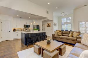 a kitchen and living room with a couch and a table at Lake Vista Lodge in Jasper