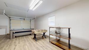 a room with a ping pong table and a pool table at Waterfront oasis 3BR Game Room Pet Friendly in Little Egg Harbor Township +24 photos
