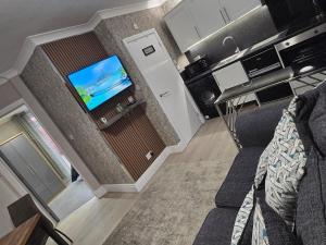 an aerial view of a living room with a television at Levy Nook 6 in Darlington