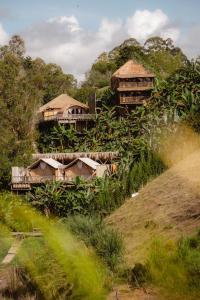 a group of houses on top of a hill at Atma Villas Hotel Boutique Guatapé in Guatapé