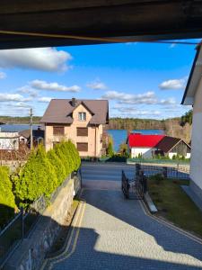 a view of a house from a balcony at U Władzia in Gowidlino +2 photos