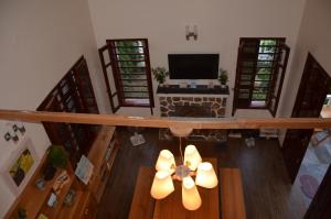 an overhead view of a living room with a fireplace at Kết nối home in Hai Phong