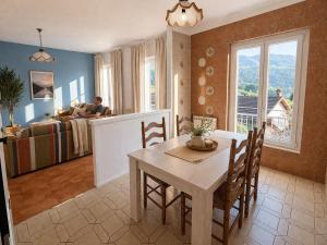 a dining room and living room with a table at Agata Agnese Homes in Carlazzo