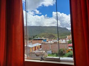 a view of a city from a window at Colca Terra in Chivay