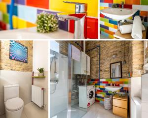 a colorful bathroom with a sink and a toilet at Mignon Szeged Apartman in Szeged