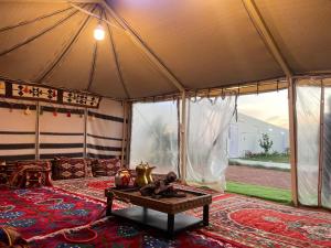a room with a tent with a table in it at شقه مفروشه in Hail