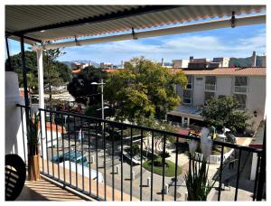 a balcony with a view of a parking lot at Casa Veracruz in Alora