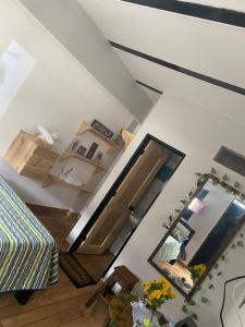 an overhead view of a living room with a mirror at Vista primavera in Salento
