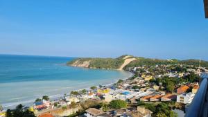 a view of the town and beach at CJC Short Stay Natal in Natal