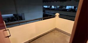 a view of a balcony of a building at night at Shillong Serviced Apartment in Shillong
