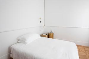 Postel nebo postele na pokoji v ubytování Senato Hotel Milano